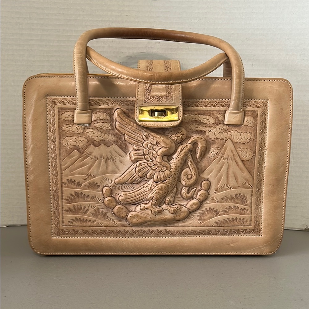 Tan Leather Satchel with Embossed Design and Gold Clasp